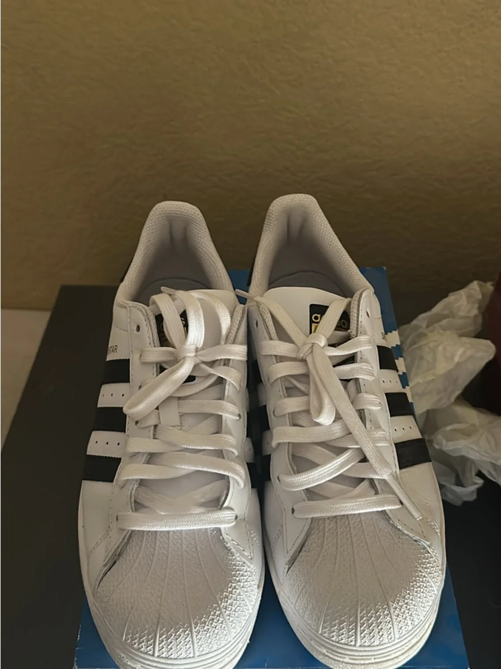adidas Superstar white and black sneakers